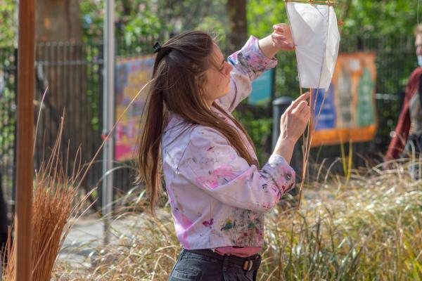 artist with paper lantern